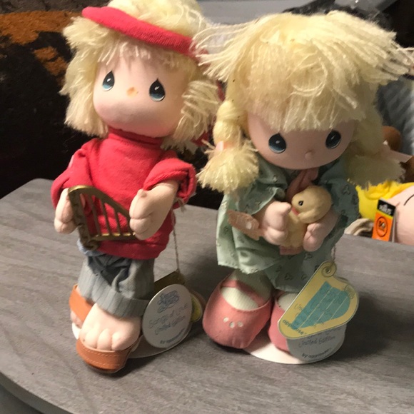 Two precious moments dolls